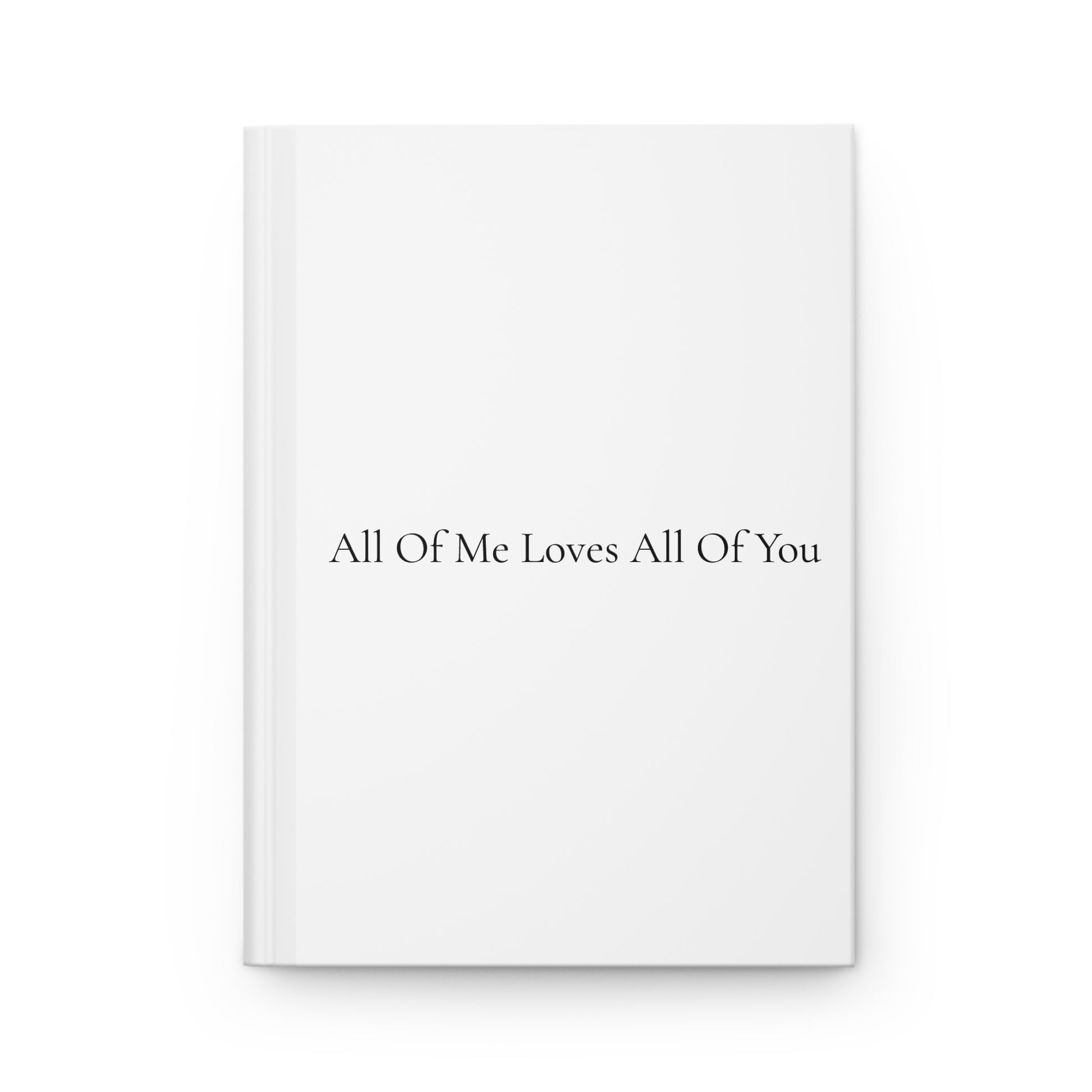 White book with black text 'All Of Me Loves All Of You' on a white background