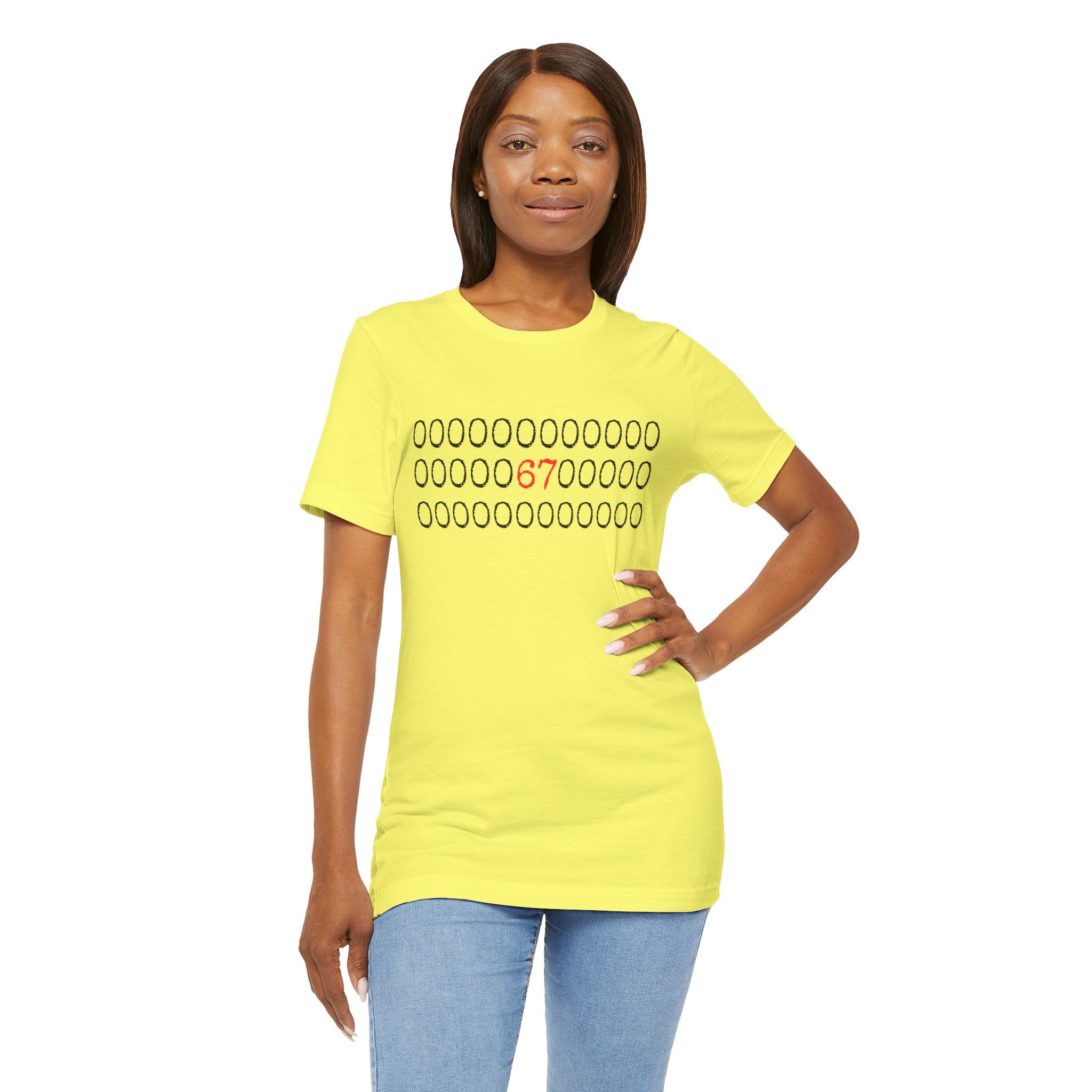 Yellow t-shirt with rows of circles and a red '67' graphic, worn by a woman with jeans