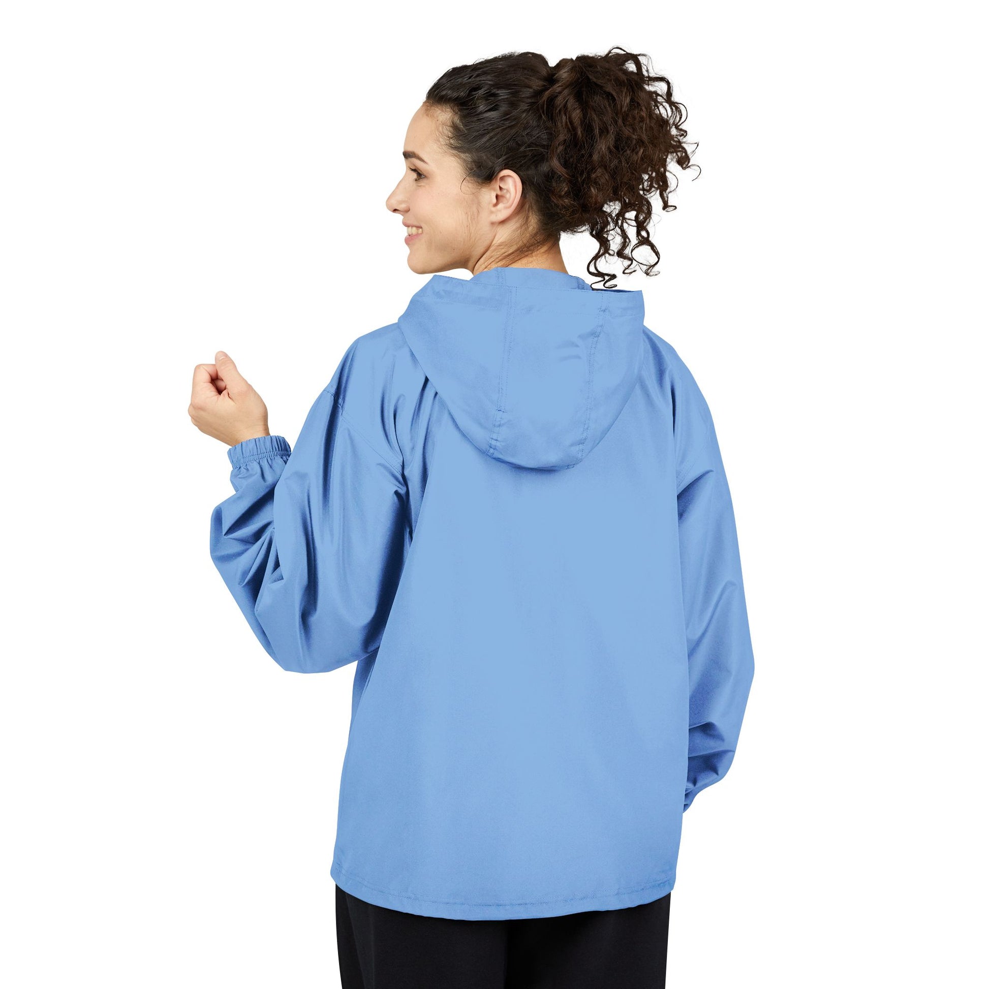 Woman wearing a blue jacket on a white background
