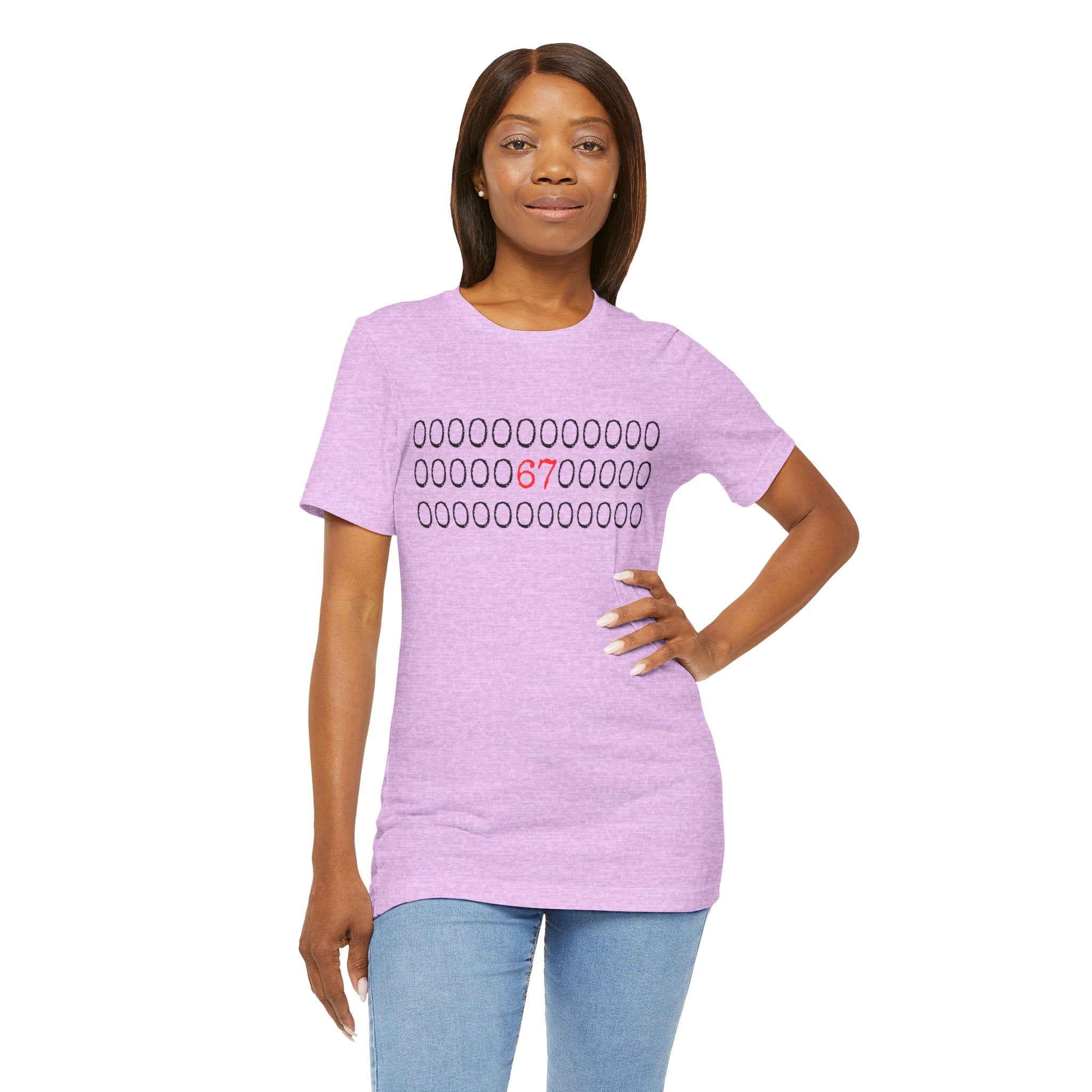 Heather lilac t-shirt with rows of circles and a red '67' graphic, worn by a woman with jeans
