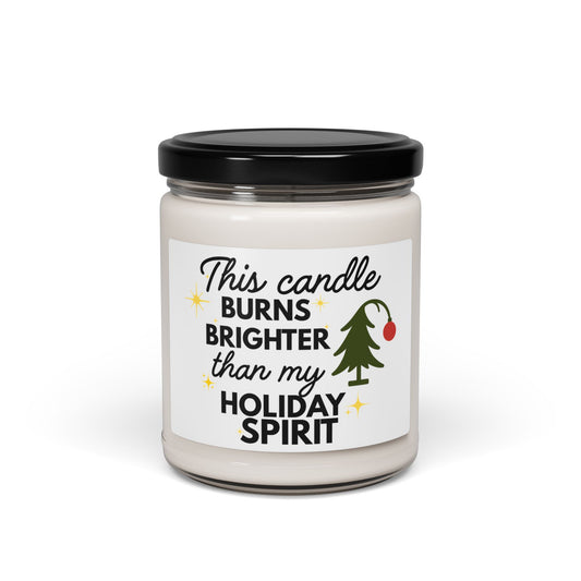 Candle with a label reading 'This candle burns brighter than my holiday spirit' on a white background