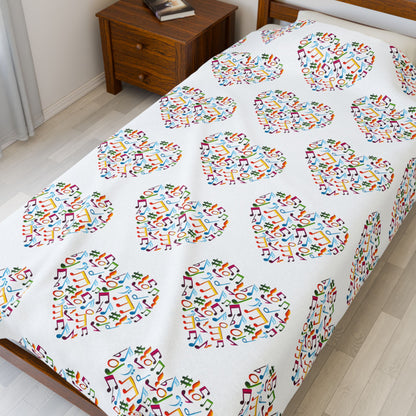 Hearts blanket with bright multicolor music symbols