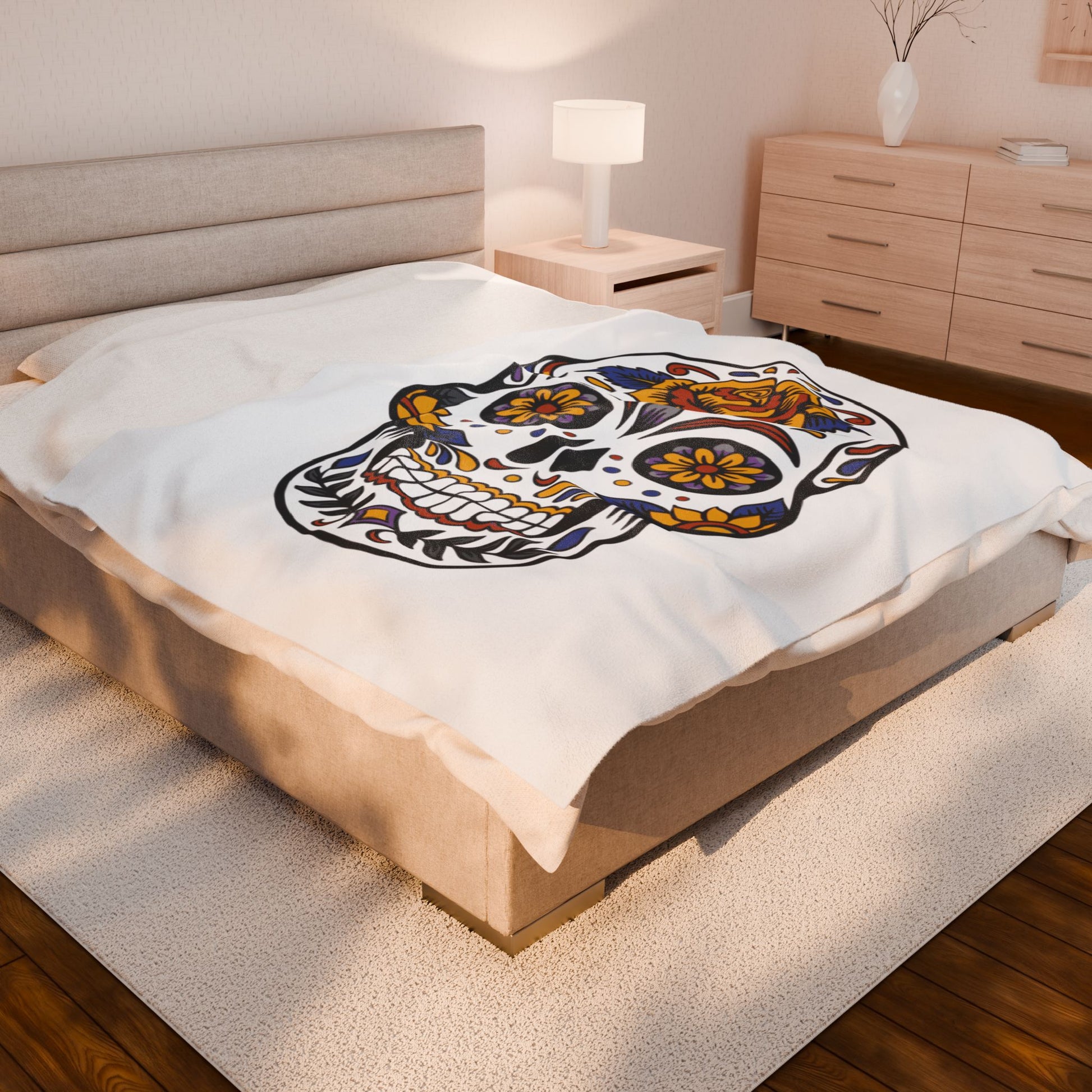 Sugar skull blanket on a bed in a bedroom setting
