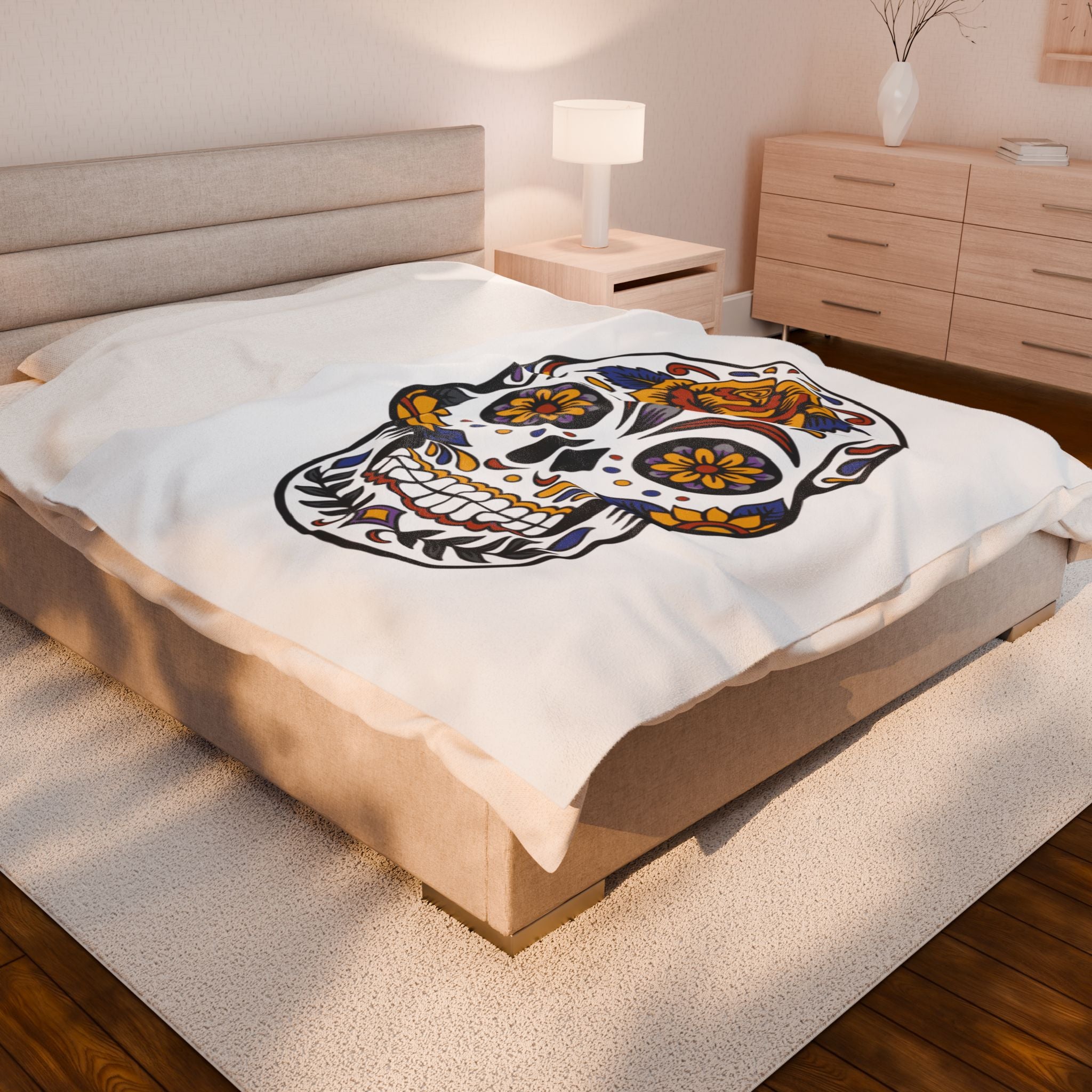 Sugar skull blanket on a bed in a bedroom setting