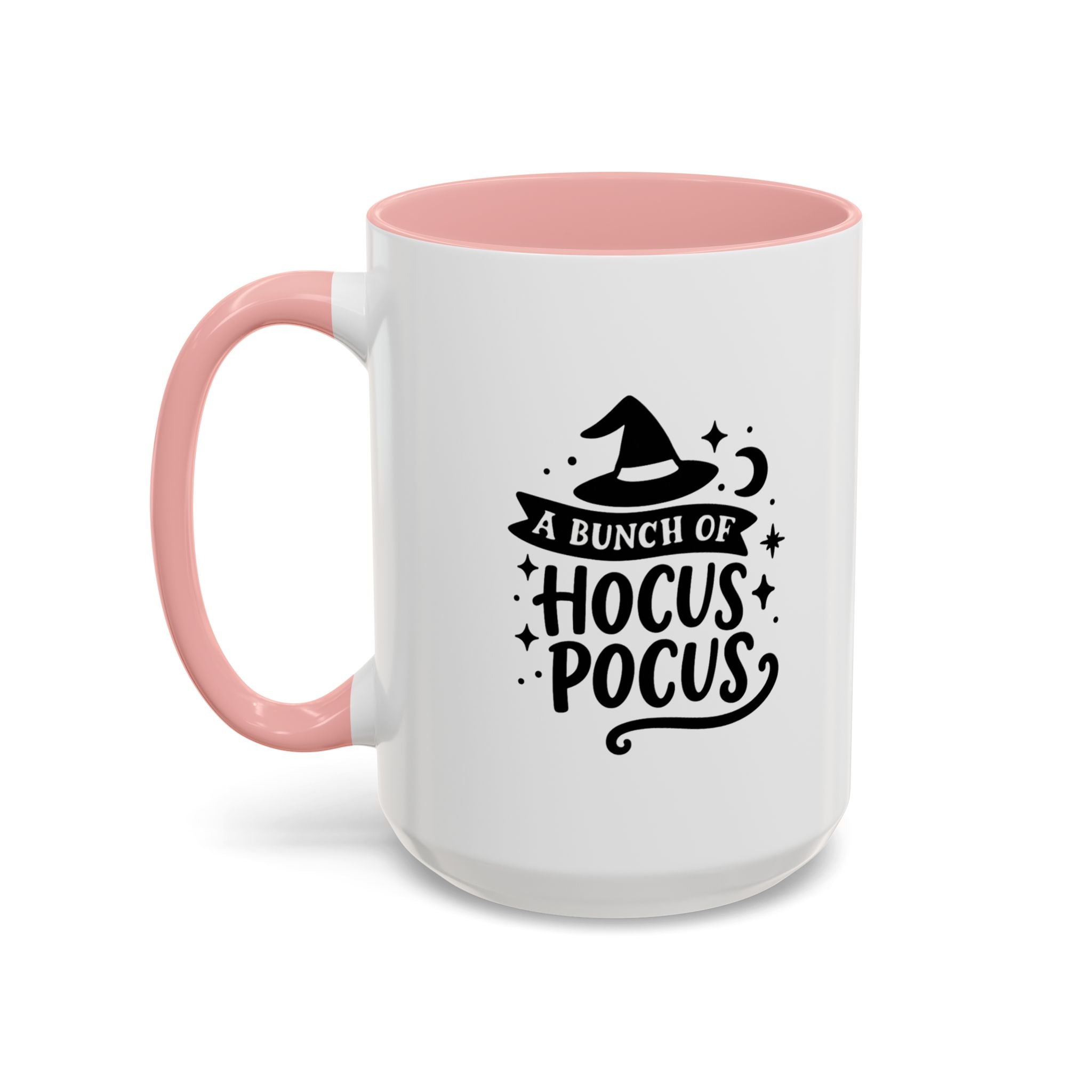 White two-tone coffee mug with a pink handle and interior and a black 'A Bunch of Hocus Pocus' witch-hat design, on a white background