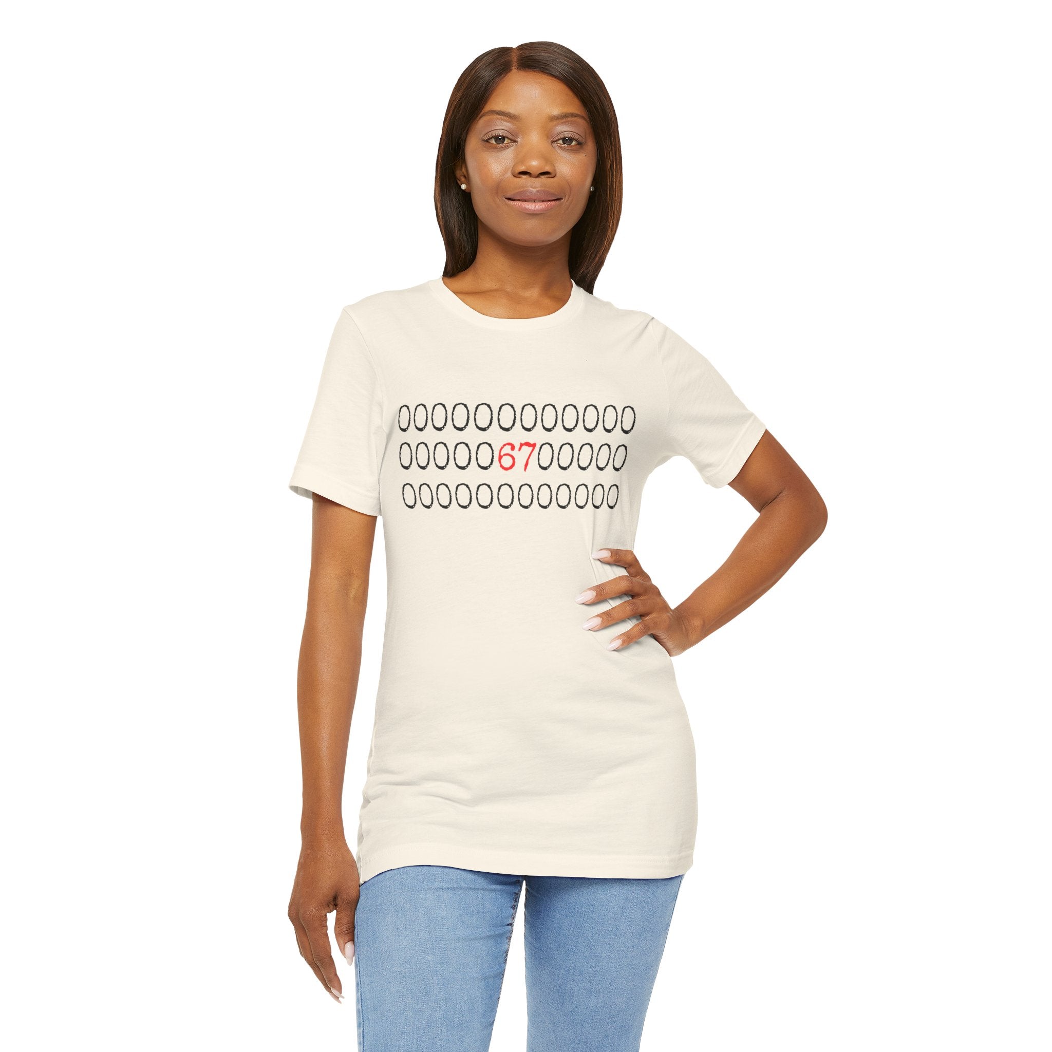 Natural cream t-shirt with rows of circles and a red '67' graphic, worn by a woman with jeans