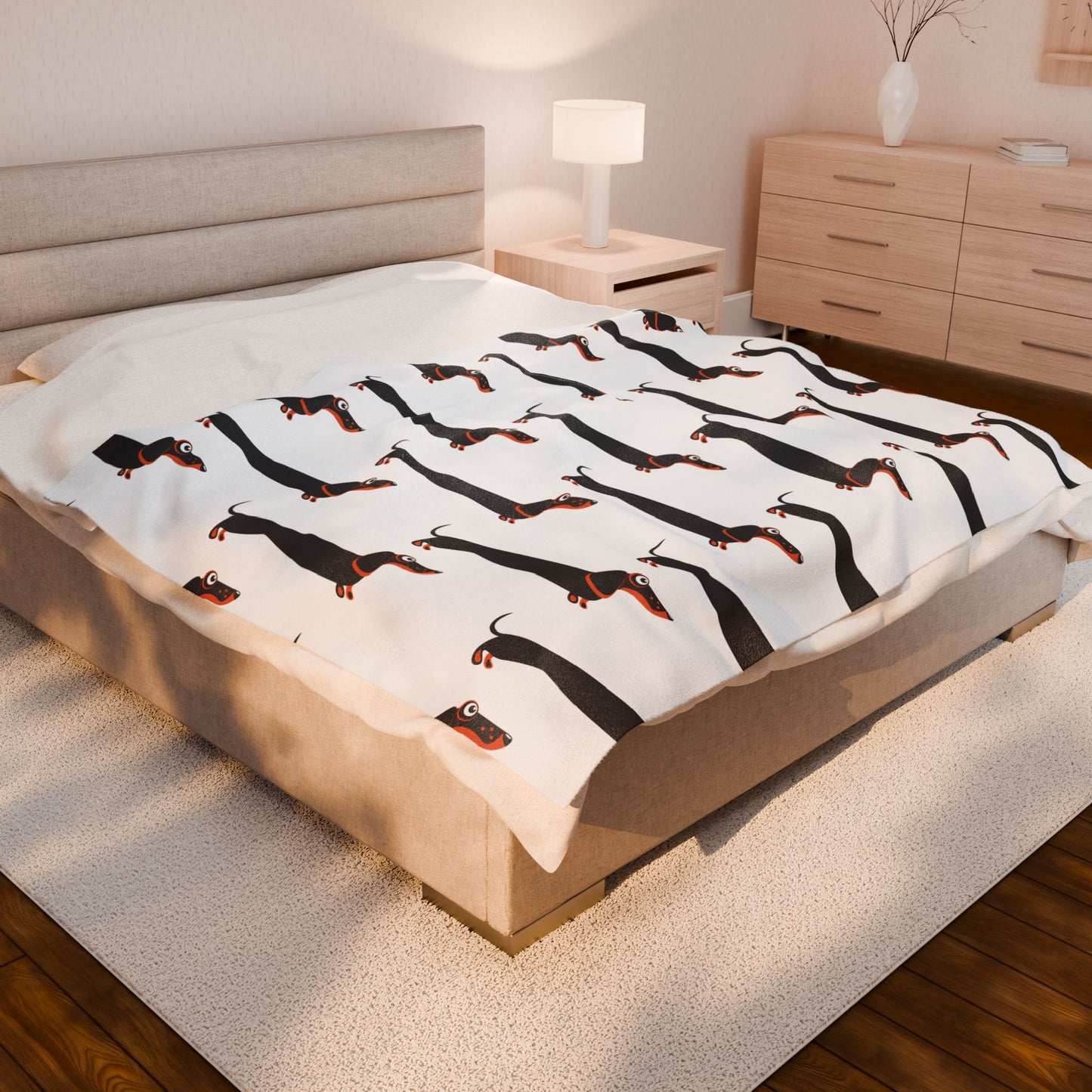 Dachshund blanket on bed in a bedroom