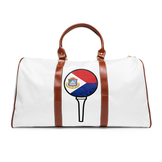 White duffel bag with brown handles and a graphic of a golf ball on a tee, featuring red, white, and blue colors.
