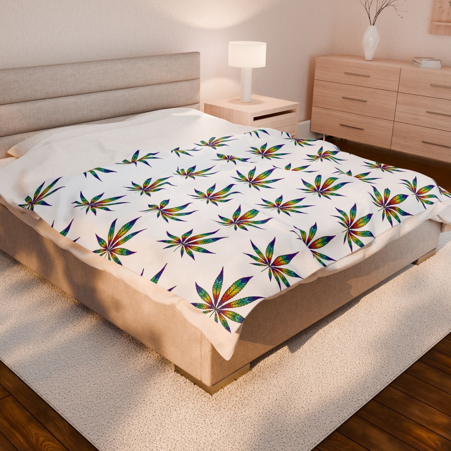Cannabis Leaf Blanket with rainbow patterns on medium bed