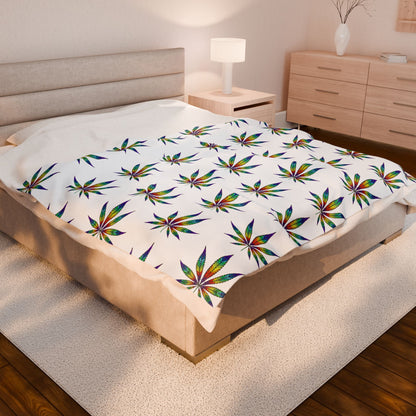 Cannabis Leaf Blanket with rainbow patterns on medium bed