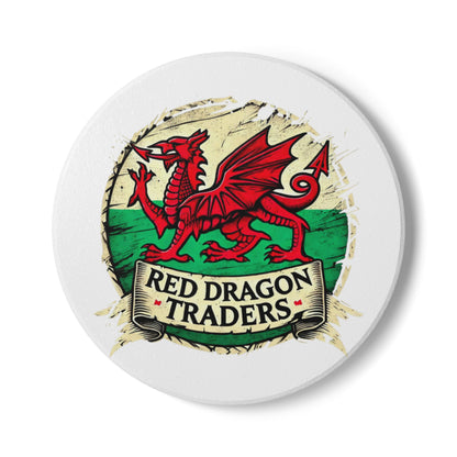Round white coaster with red dragon design and 'Red Dragon Traders' text on a white background