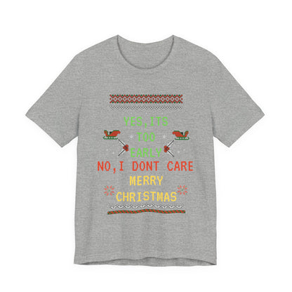 Gray t-shirt with Christmas-themed text and graphics on a white background
