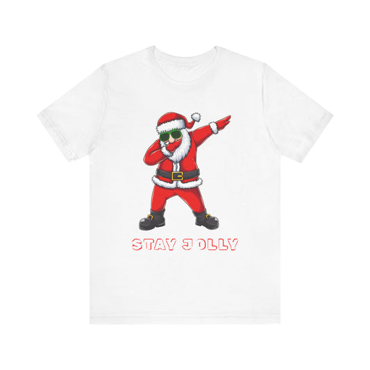 White t-shirt with a graphic of a dabbing Santa Claus and 'Stay Jolly' text on a white background