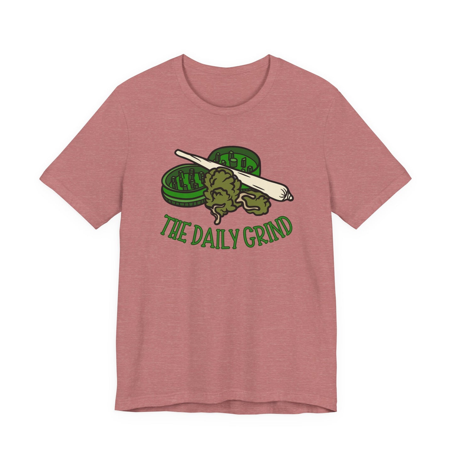 Pink t-shirt with green graphic and 'The Daily Grind' text on a white background