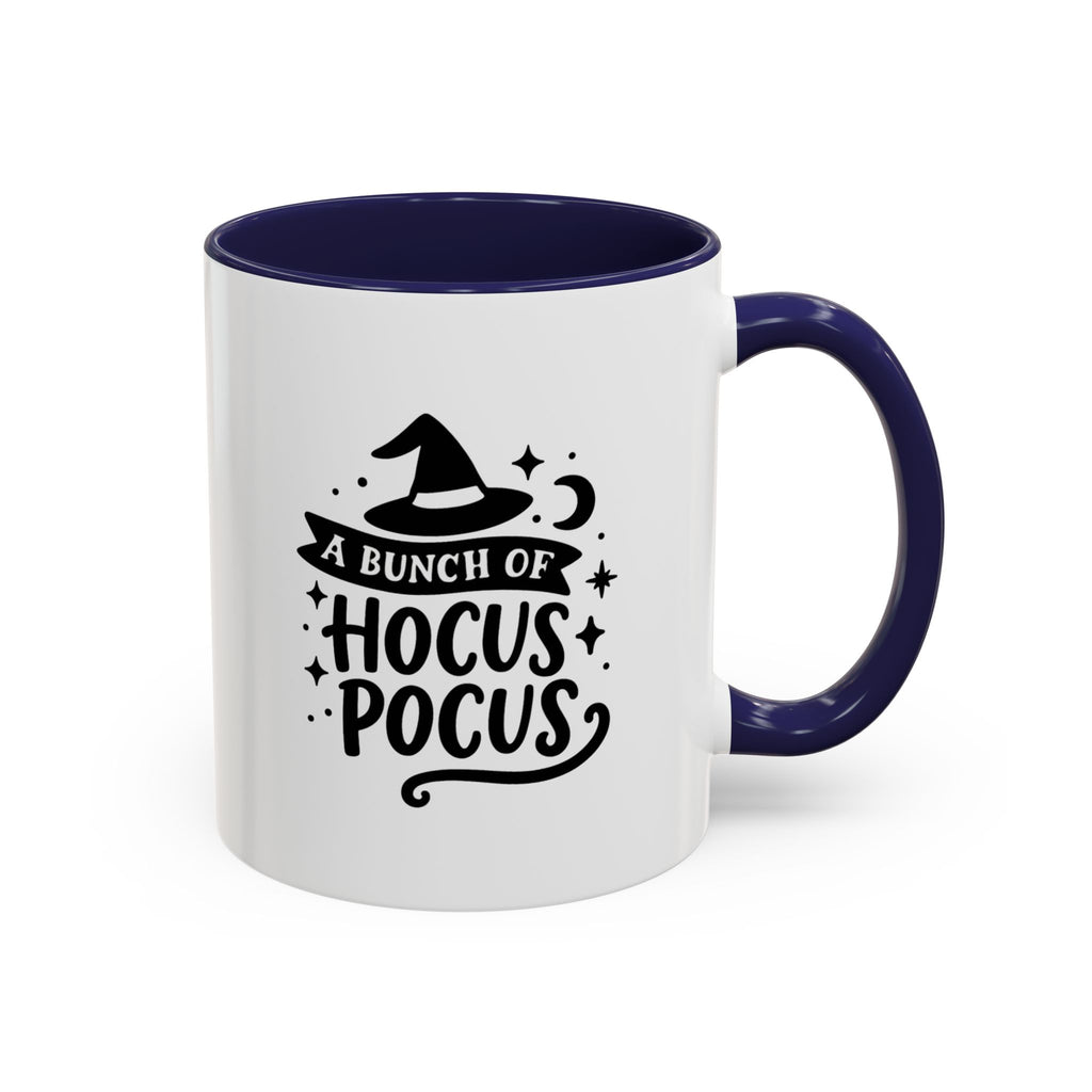 White two-tone coffee mug with a navy handle and interior and a black 'A Bunch of Hocus Pocus' witch-hat design, on a white background