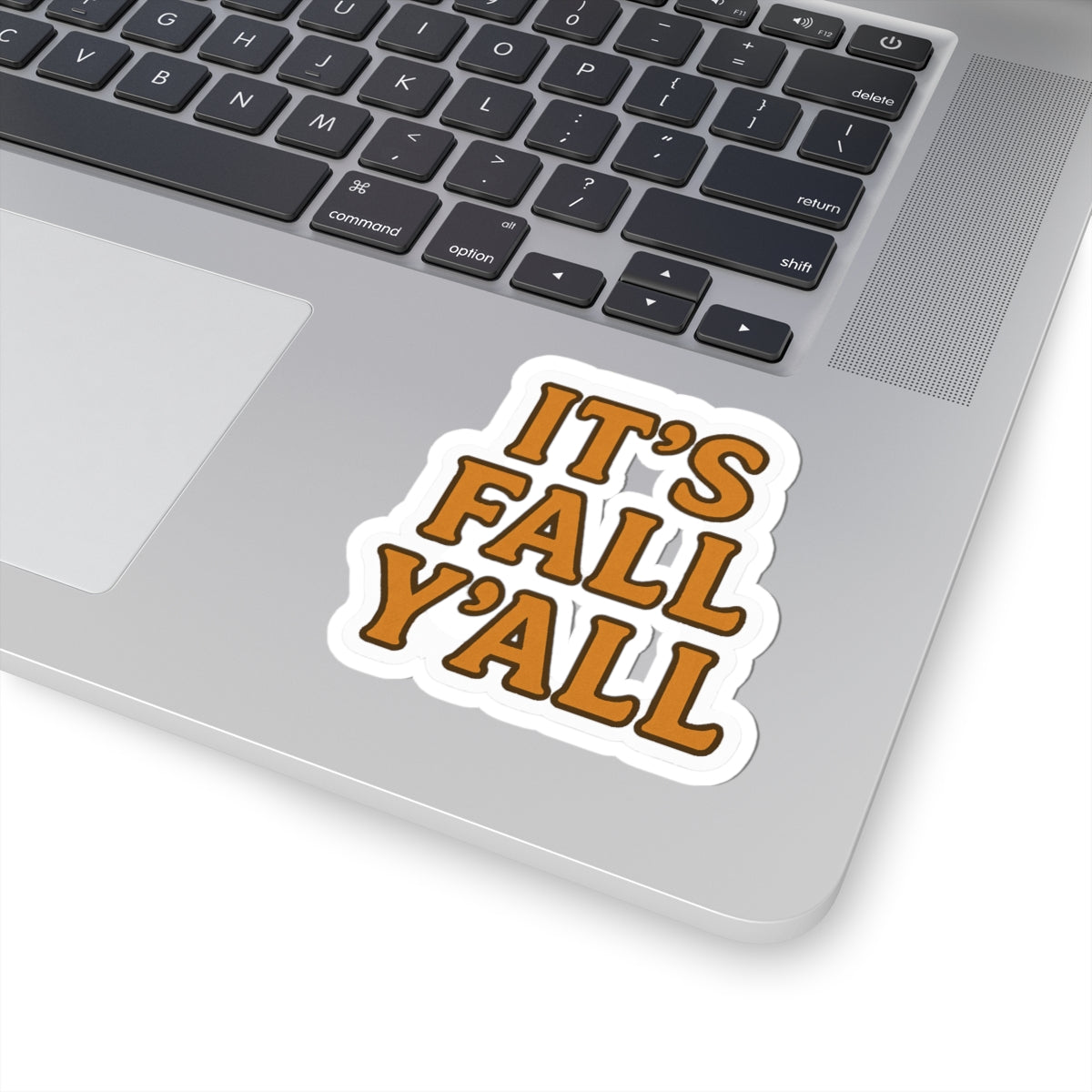 Laptop with a 'It's Fall Y'all' sticker on the palm rest area