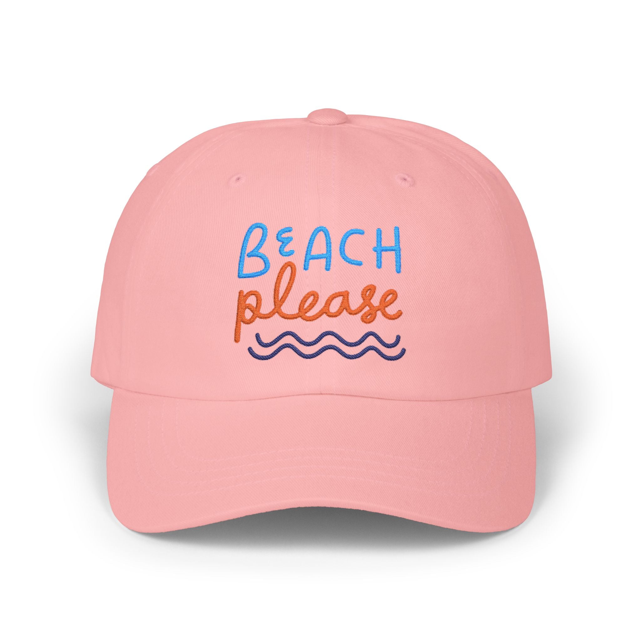 Pink dad cap with embroidered 'Beach Please' text in blue and orange with a wave, front view on a white background