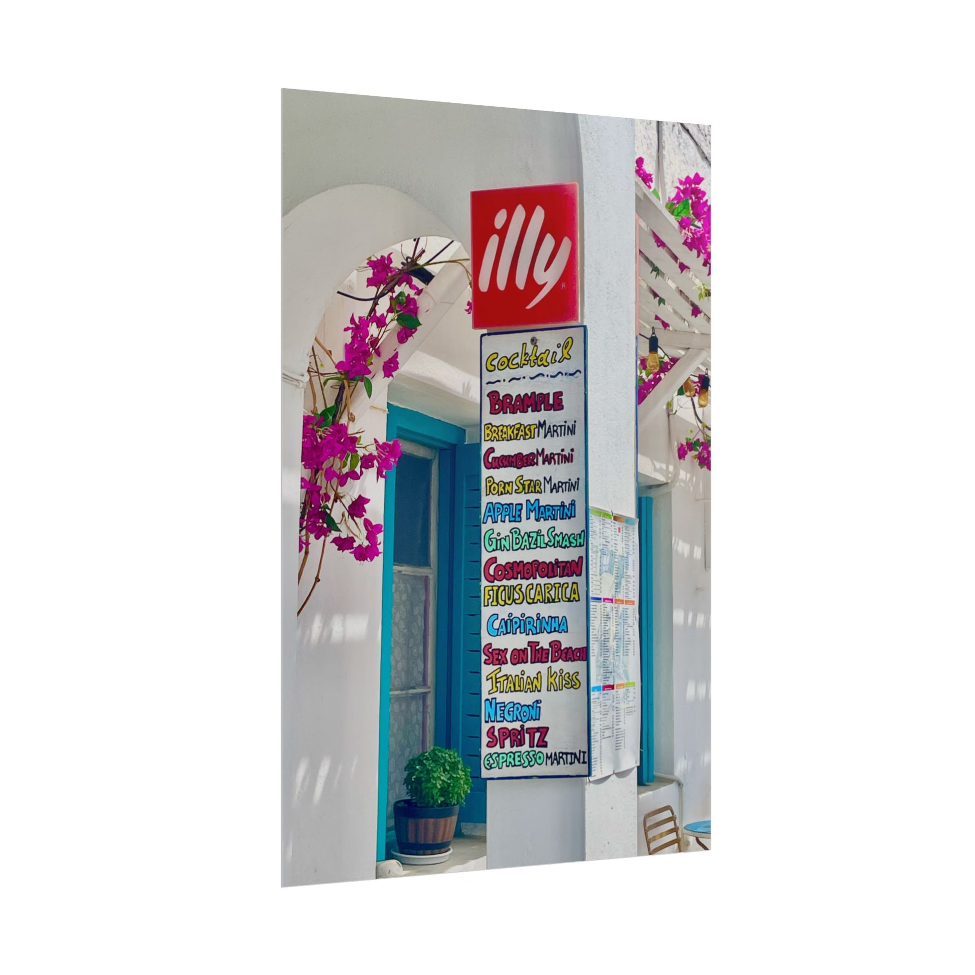 Decorative mirror with colorful text and illy logo on a white background