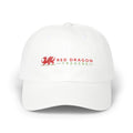 White cap with Red Dragon Traders logo on a white background