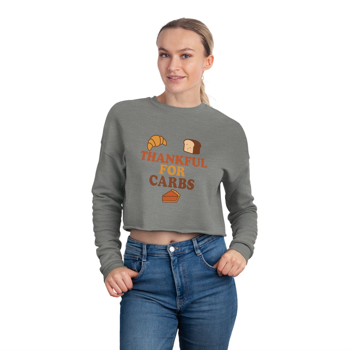 Woman wearing a gray sweatshirt with 'Thankful for Carbs' text and food graphics on a white background