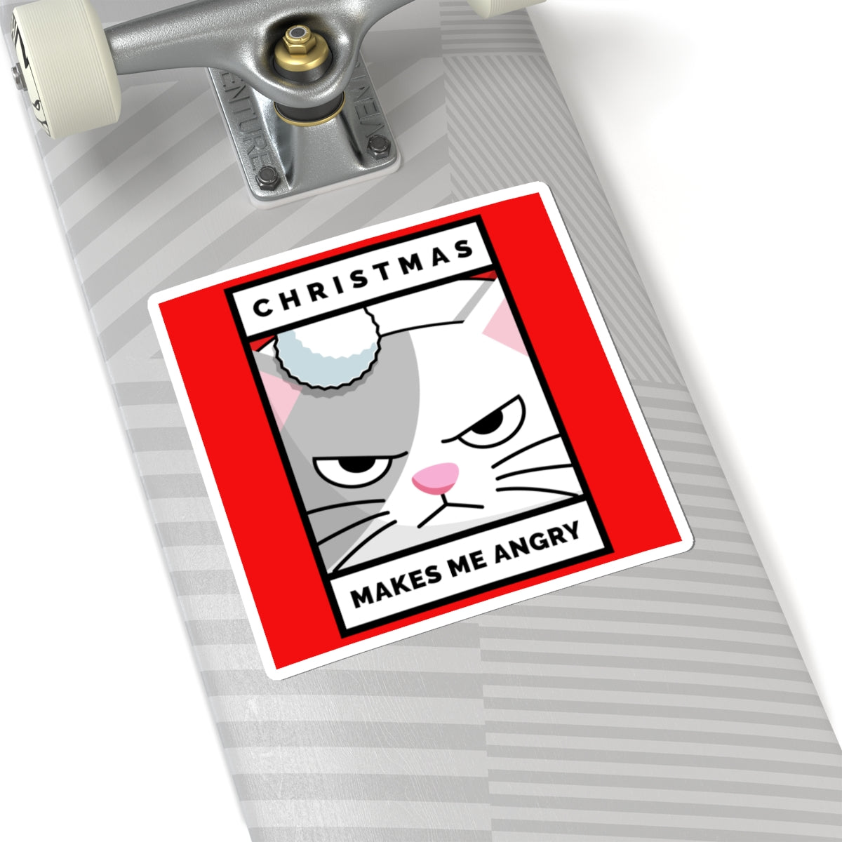 Sticker with a cat illustration and text on a skateboard deck
