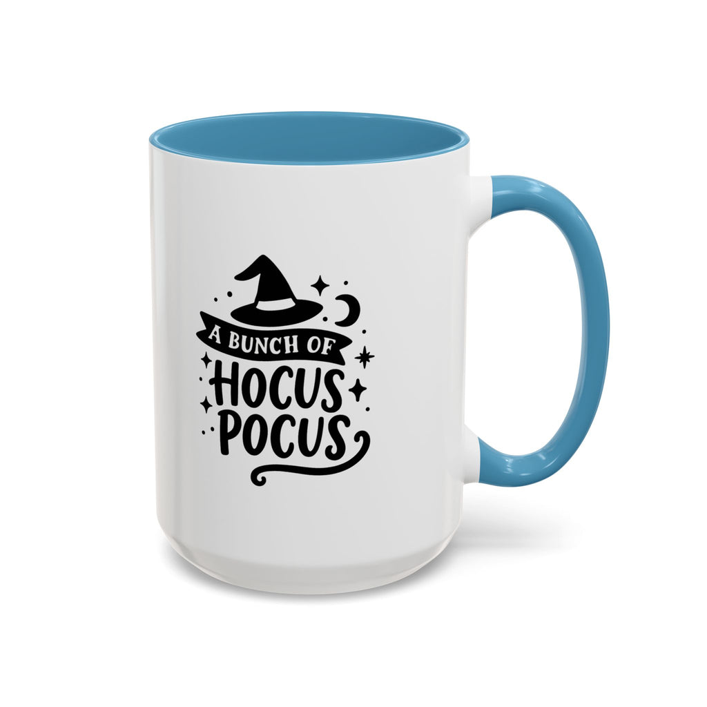 White two-tone coffee mug with a light blue handle and interior and a black 'A Bunch of Hocus Pocus' witch-hat design, on a white background