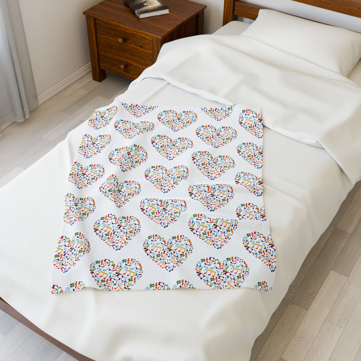 Hearts blanket with playful note and treble clef pattern