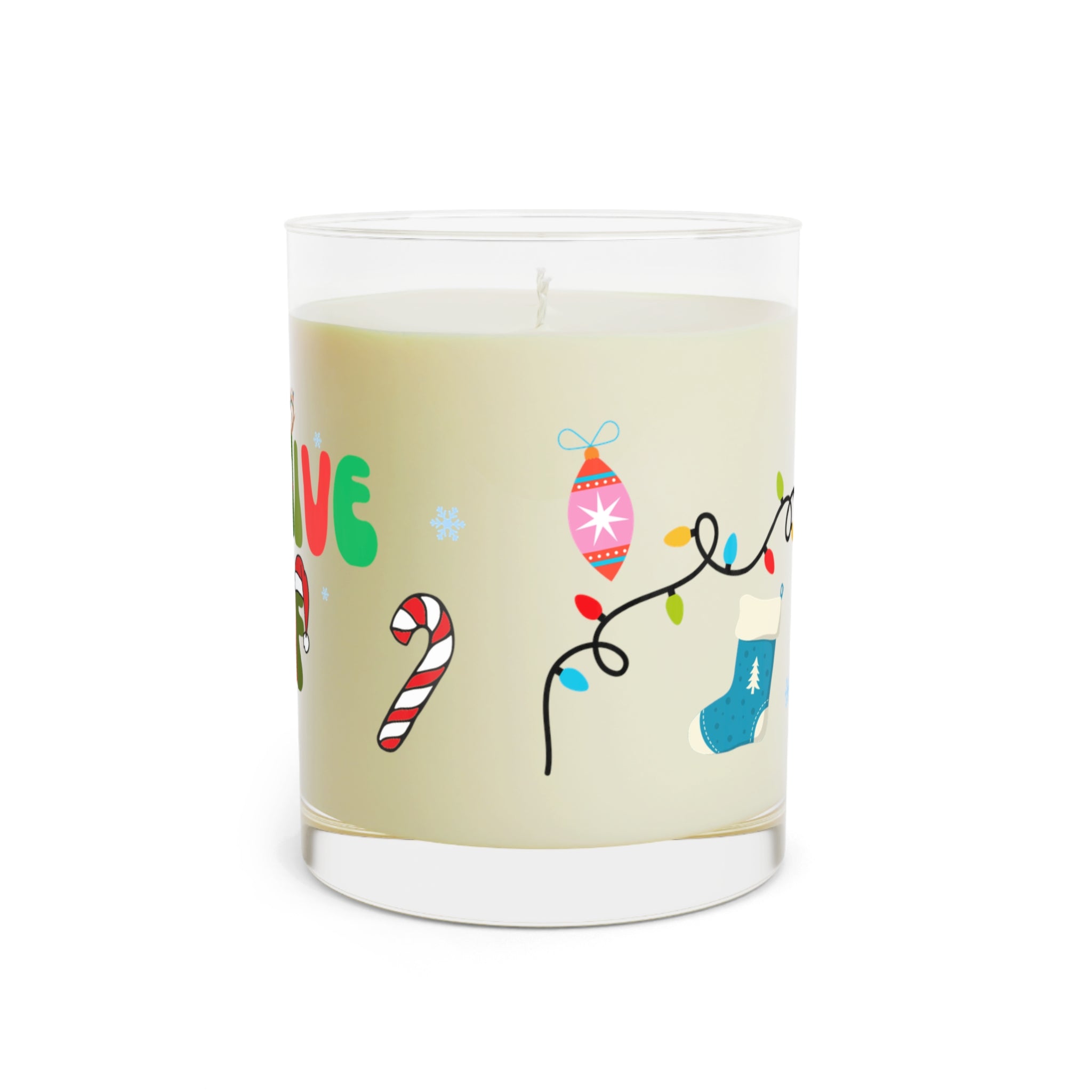 Candle with Christmas-themed label on a white background