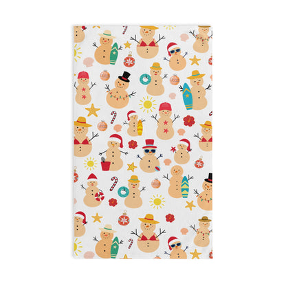 Patterned towel with cartoon snowmen on a white background
