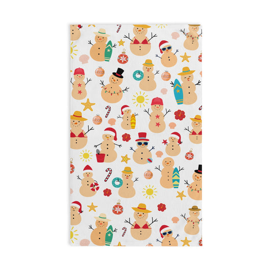Patterned towel with cartoon snowmen on a white background