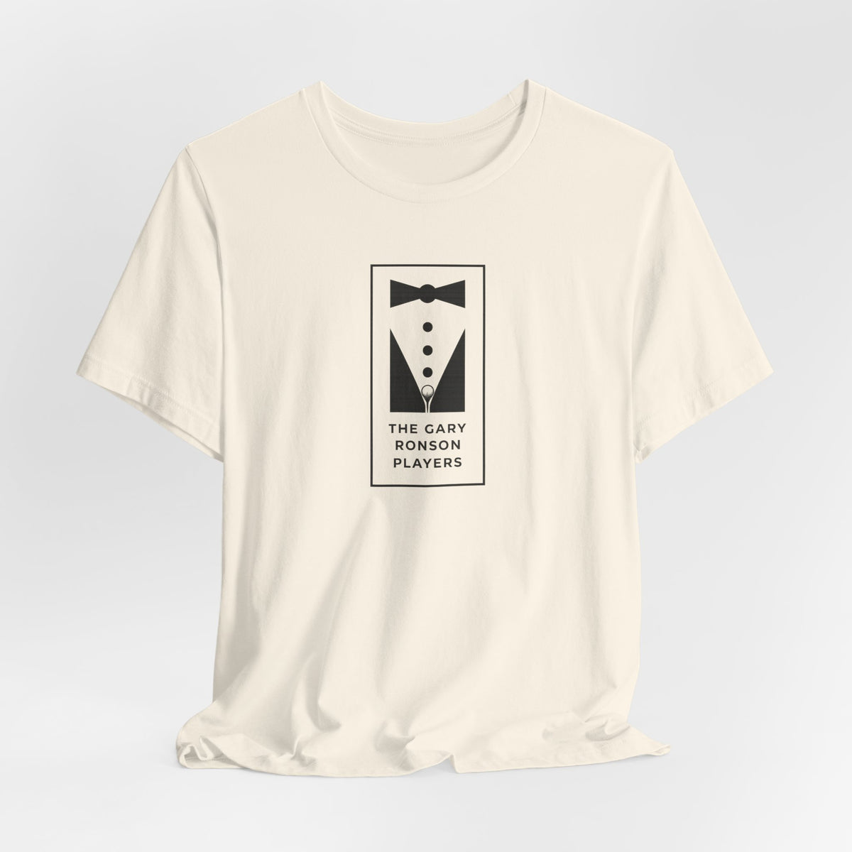 Natural cream t-shirt with a black-and-white tuxedo graphic and 'The Gary Ronson Players' text, front view on a white background