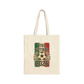 Natural canvas tote bag with a Viva Futbol 2026 design of a soccer ball and marigolds on Mexican flag green, white, and red, on a white background.