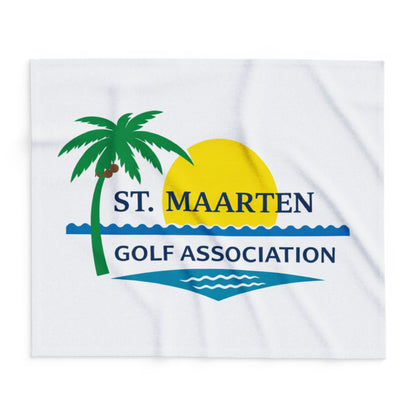 White towel with St. Maarten Golf Association logo featuring a palm tree, sun, and waves.